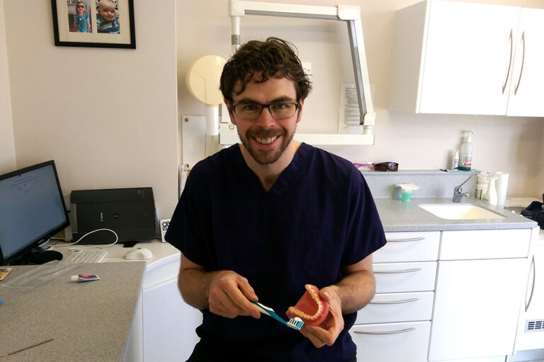 Demonstration of brushing gums