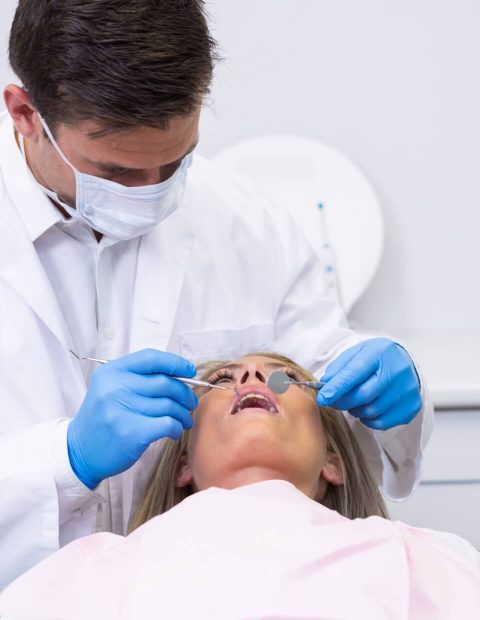 Dental exam on a woman